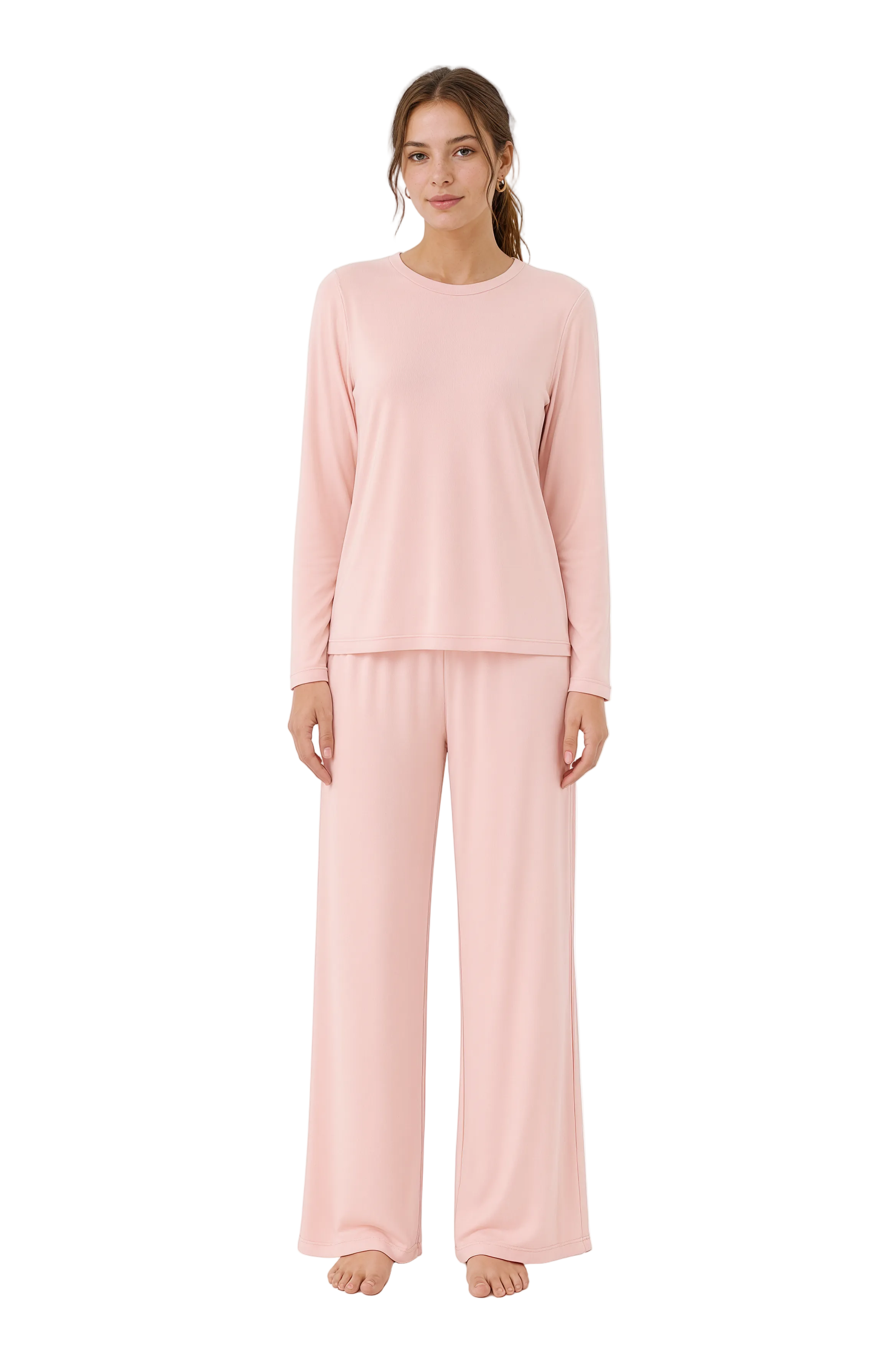 Woman wearing a pink pajama set on a white background