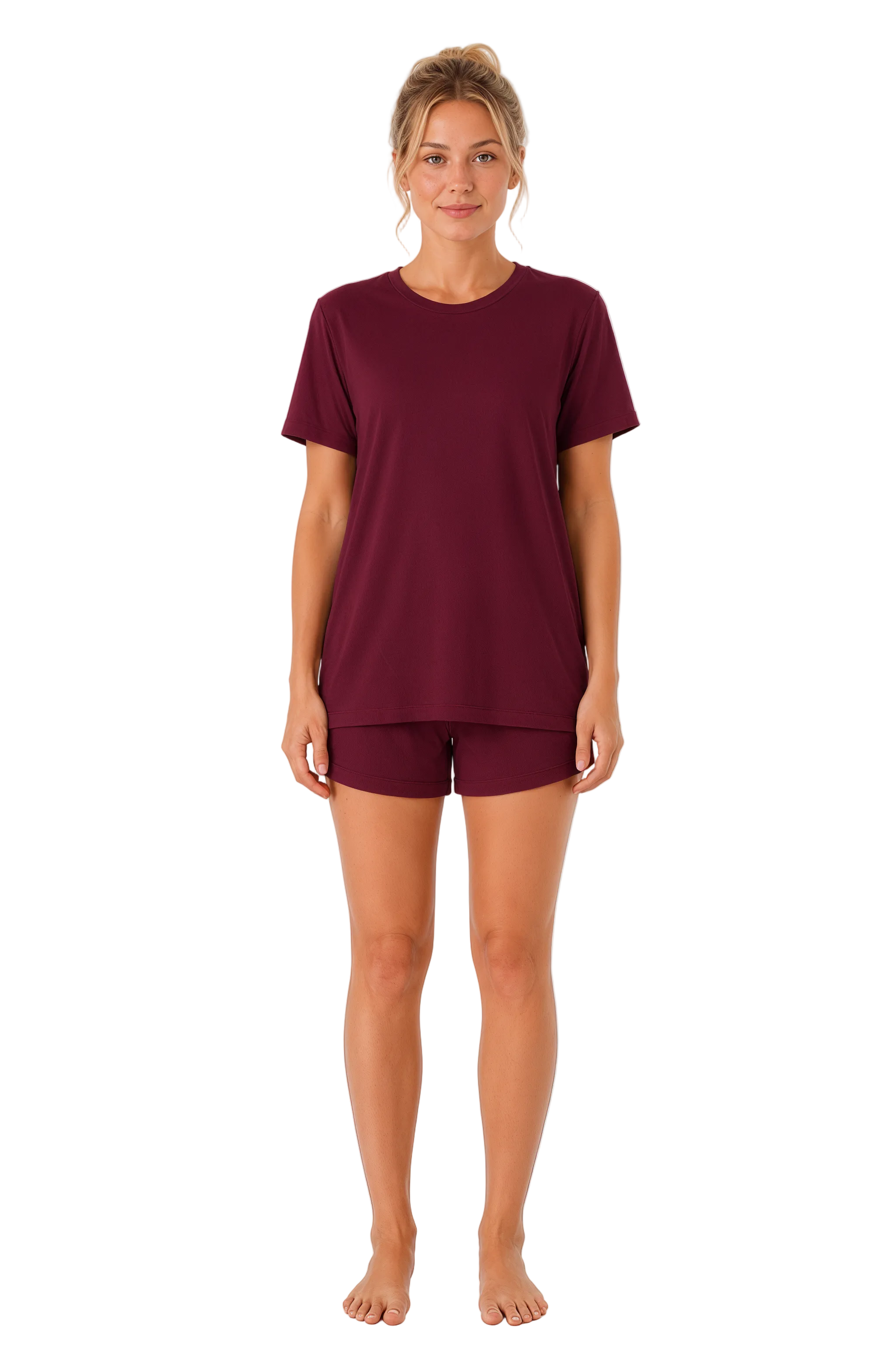 Woman wearing a burgundy t-shirt and shorts set on a white background