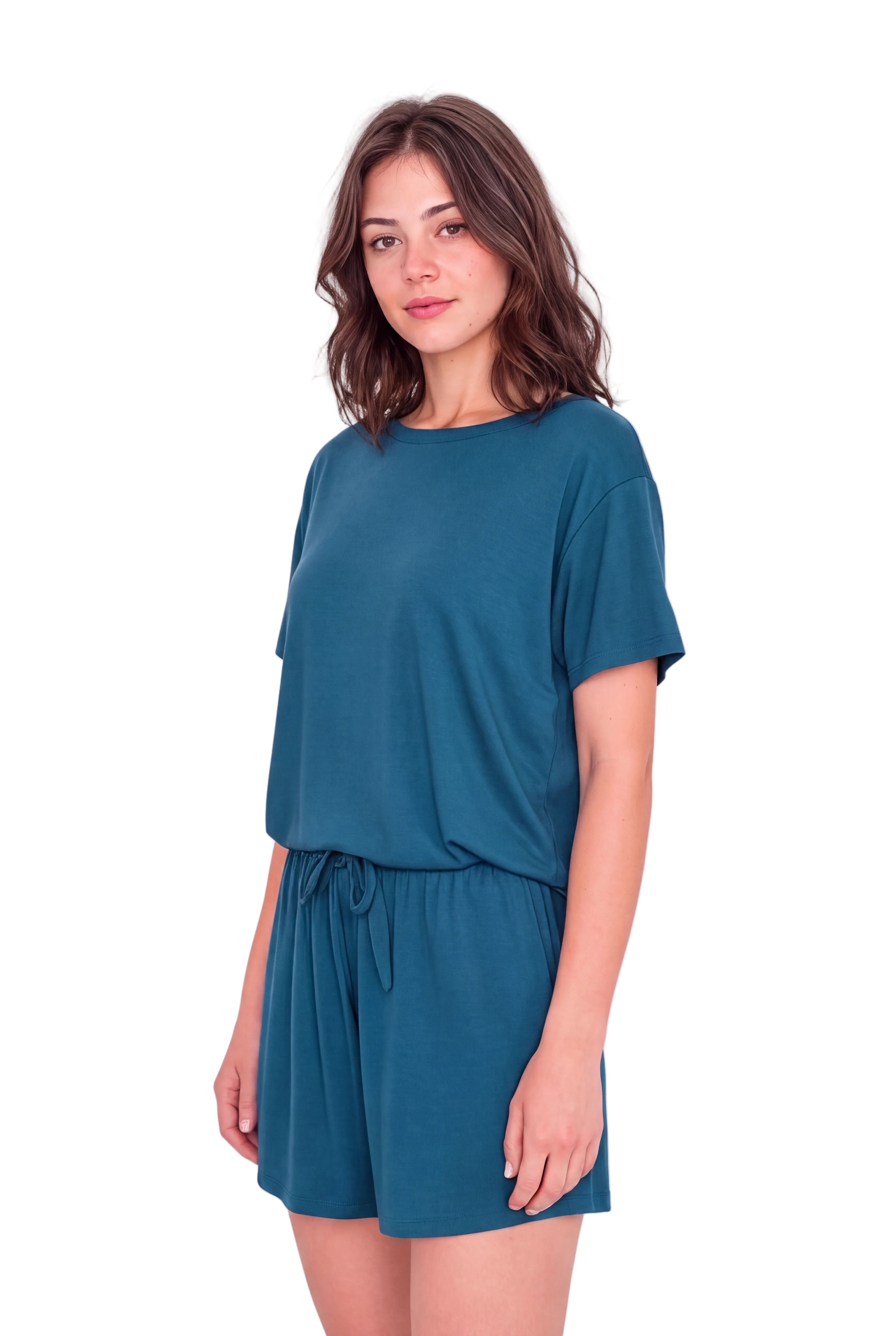 A woman modeling a matching teal blue lounge set consisting of a short-sleeve top and drawstring shorts, photographed against a plain light background.
