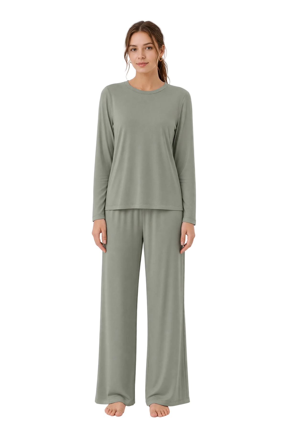 A woman modeling a two-piece lounge set consisting of a long-sleeve crewneck top and matching wide-leg pants in a muted sage green color, shot against a plain white studio background.