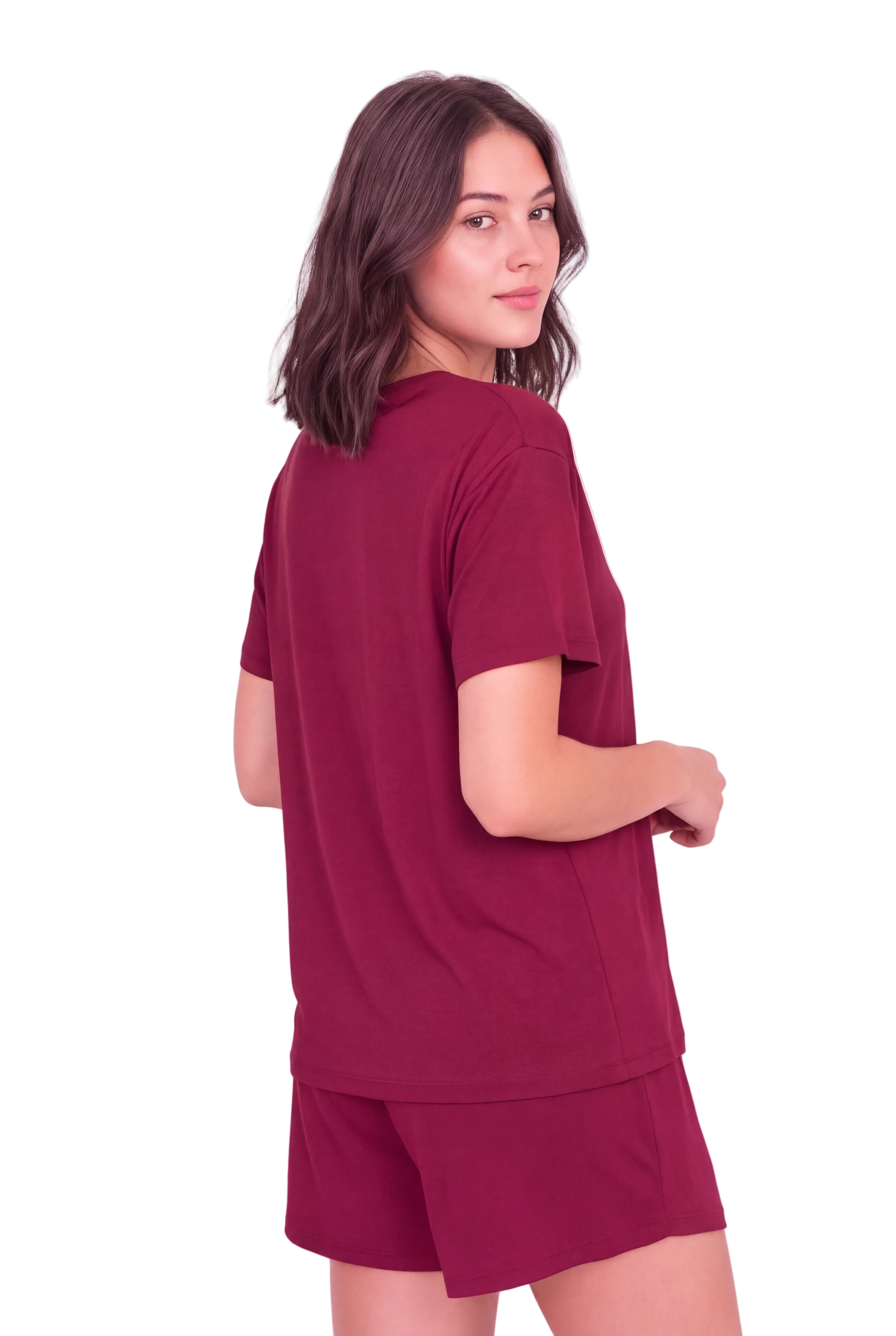 A woman wearing a matching burgundy short-sleeve t-shirt and shorts set, photographed from the back against a light pink studio background.