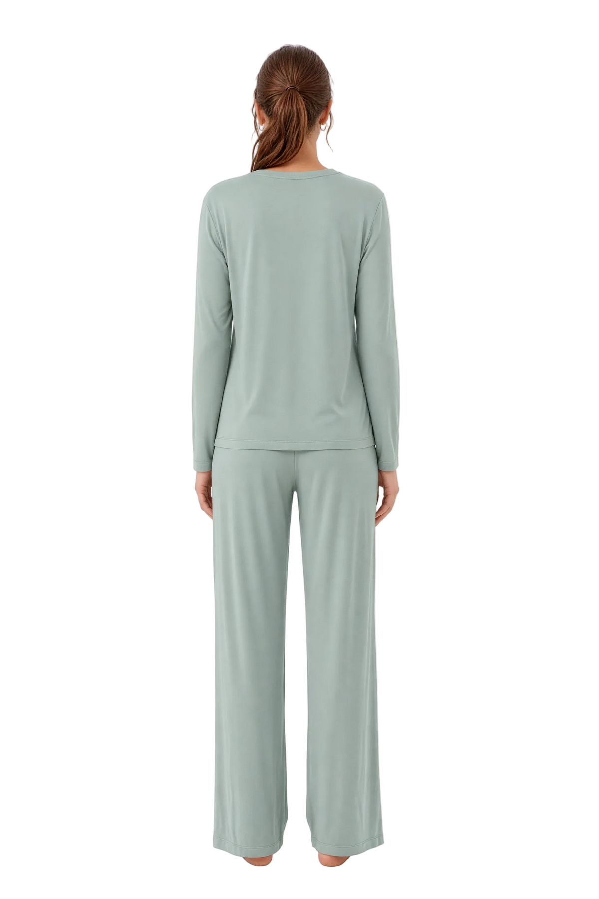 A woman viewed from the back wearing a matching sage green long-sleeve top and wide-leg pants set against a plain white studio background.