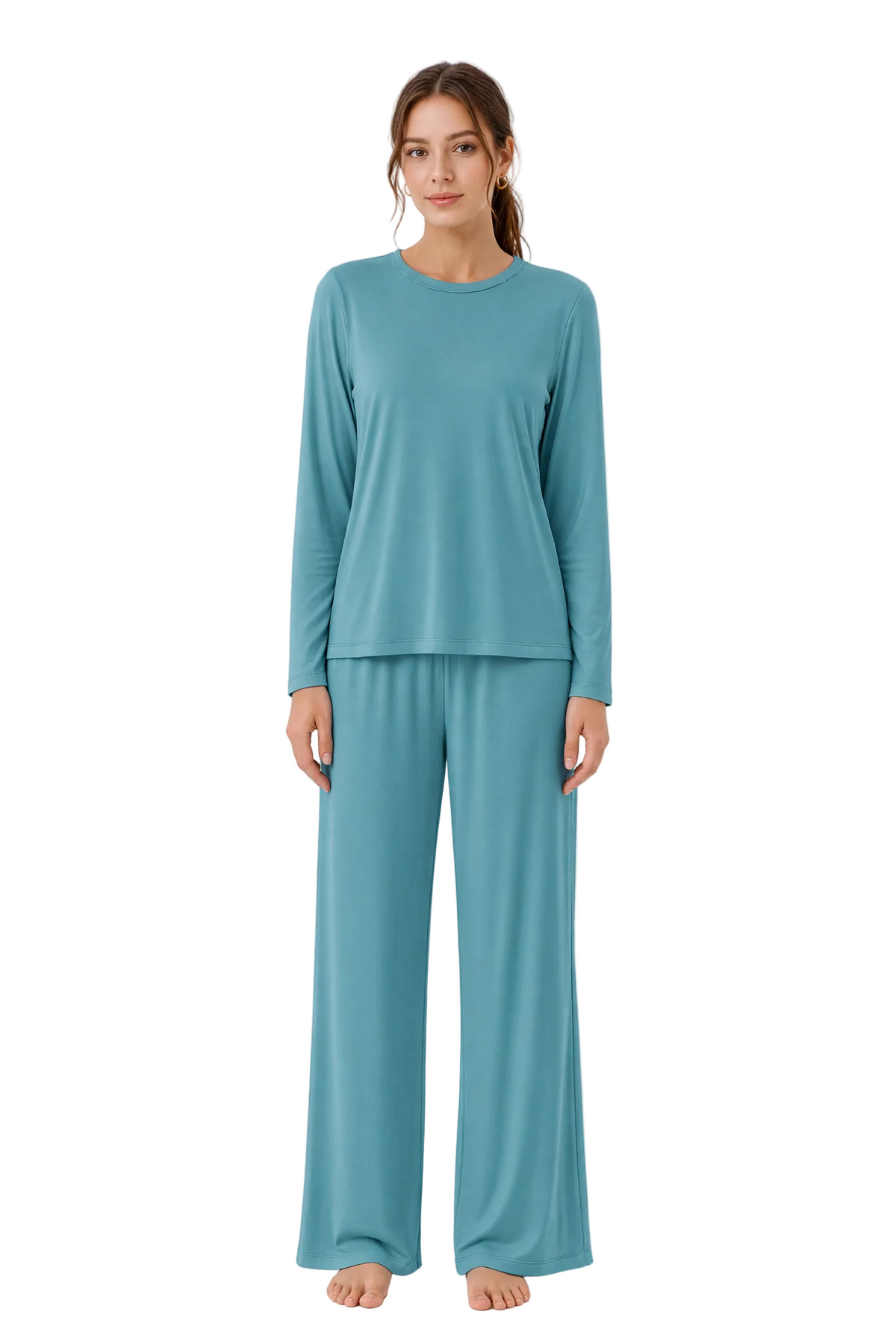 A woman modeling a matching two-piece loungewear set in a dusty teal blue, featuring a long-sleeve crewneck top and wide-leg pants, shot against a seamless white background.