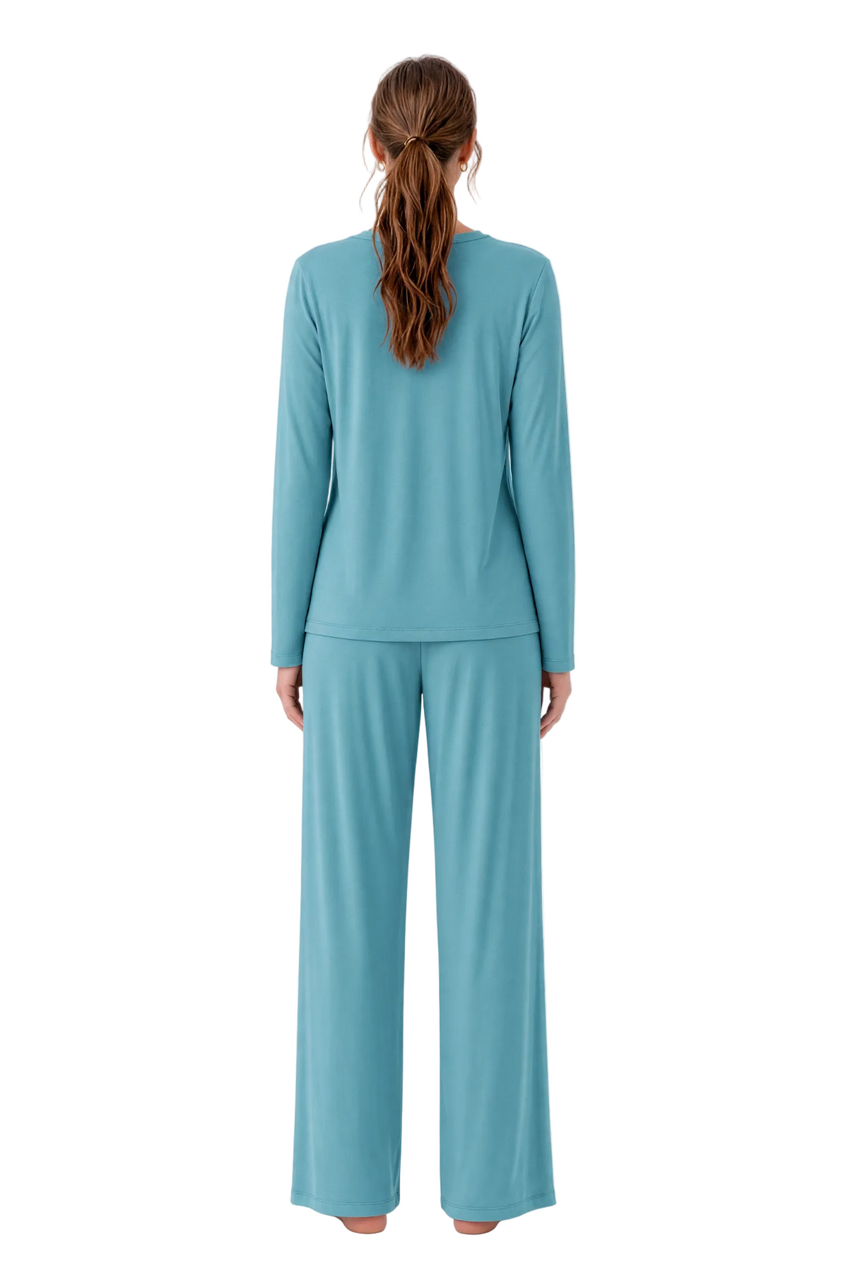 A woman viewed from the back wearing a matching long-sleeve top and wide-leg pants set in a muted teal-blue color, standing against a plain white studio background.
