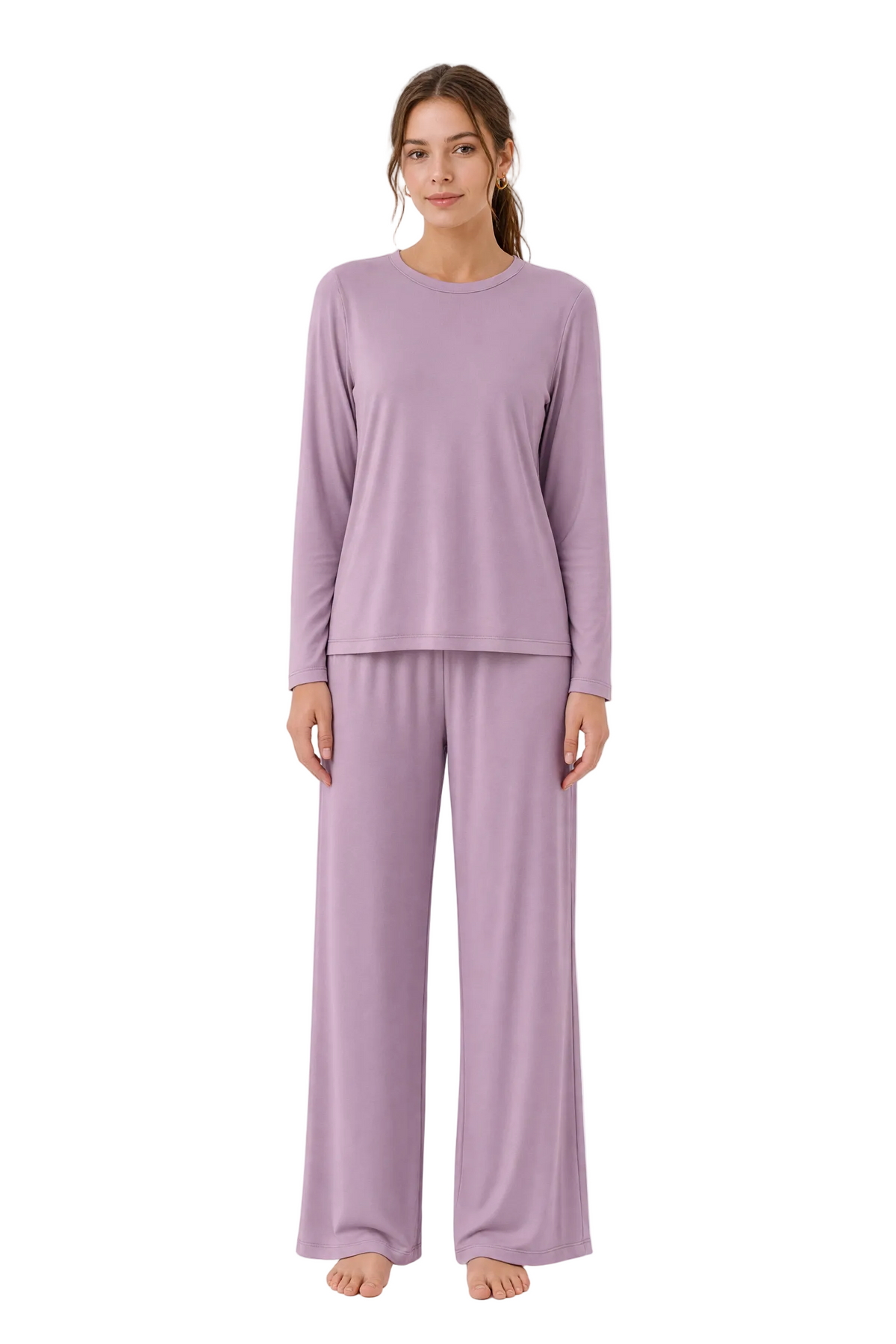 A woman modeling a matching two-piece pajama set in a dusty lavender purple color, consisting of a long-sleeve crewneck top and wide-leg pants, against a plain white background.