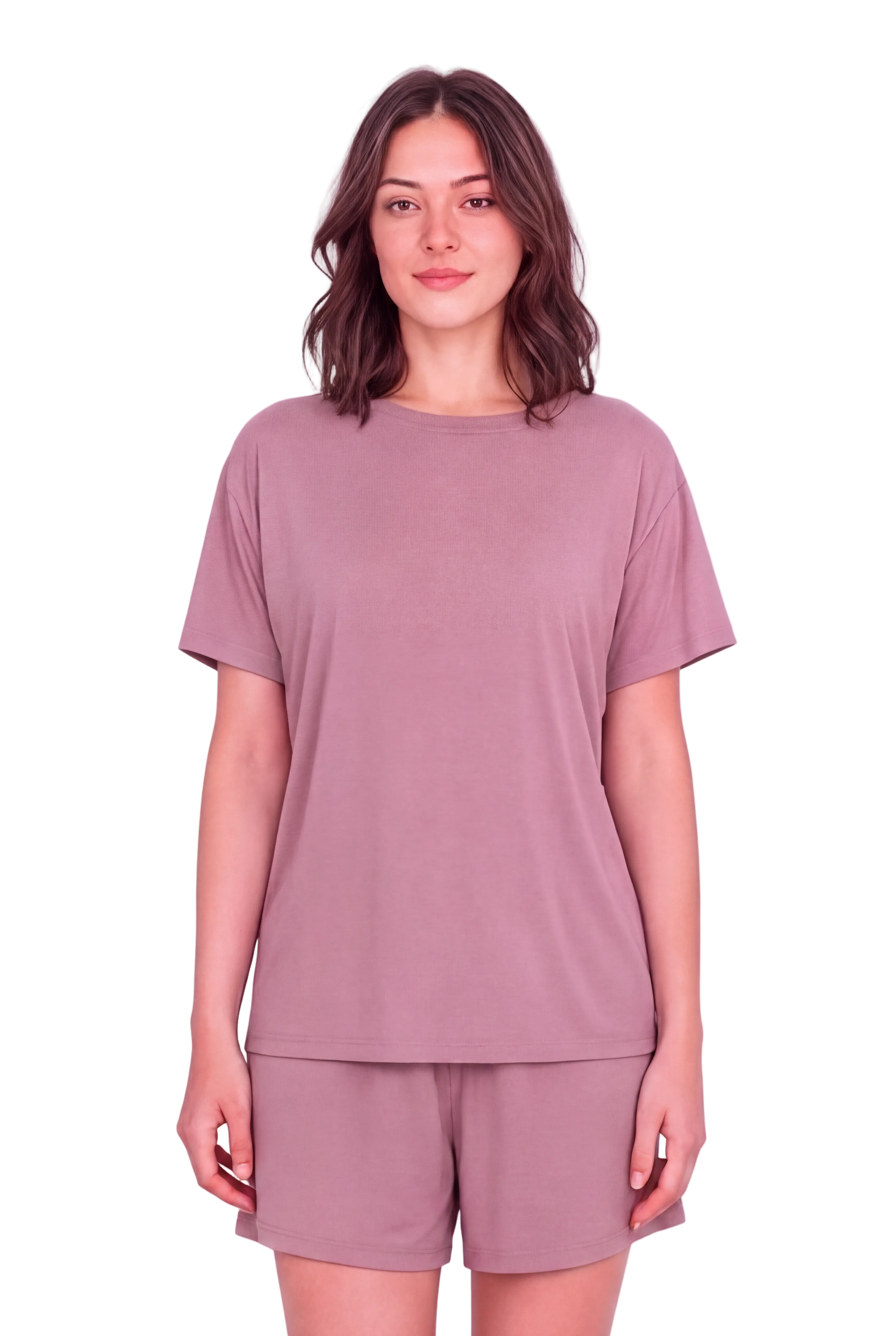 A woman modeling a matching dusty rose short-sleeve t-shirt and shorts set against a solid pale pink background.